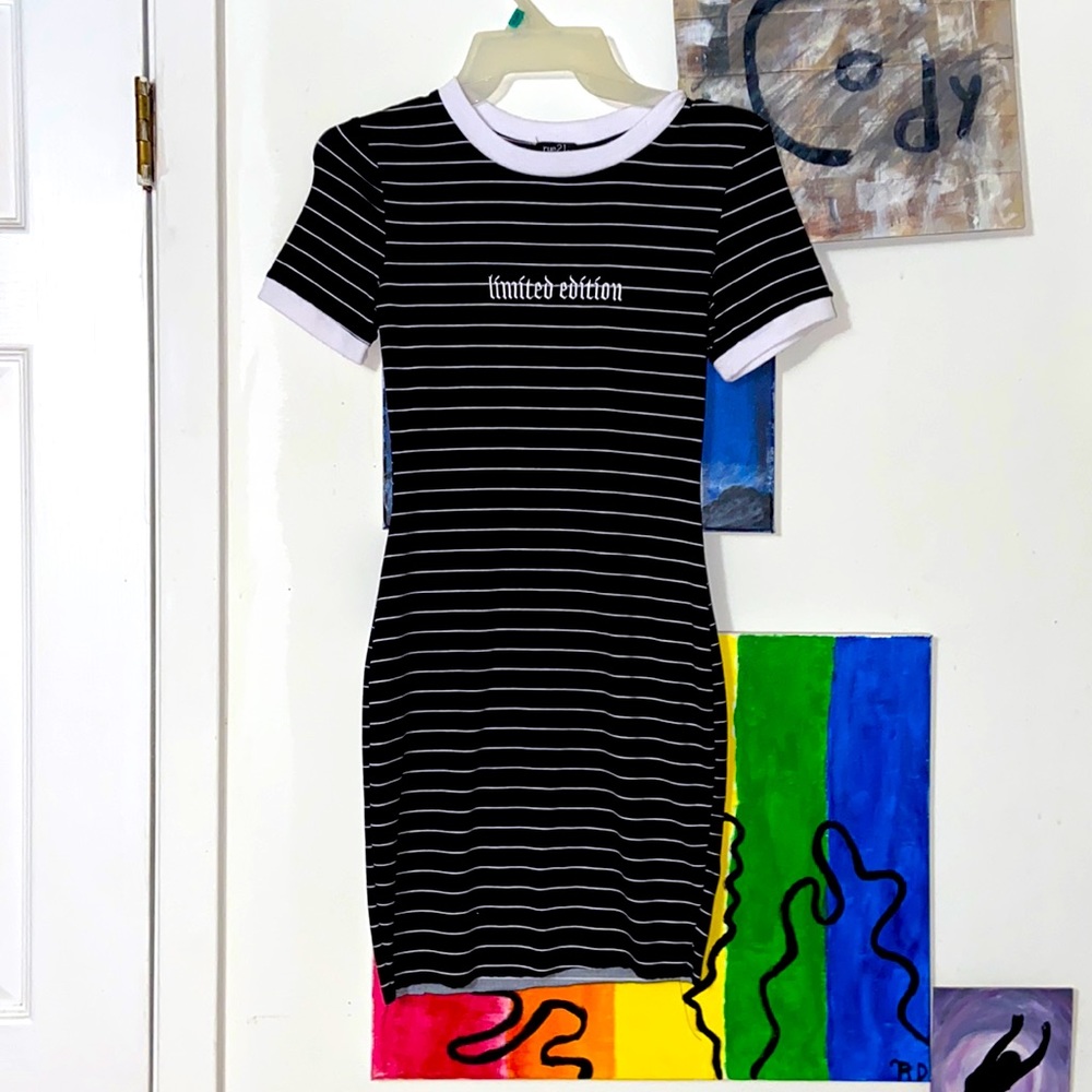 black and white striped short dress, worn once, cut at the bottom 💕